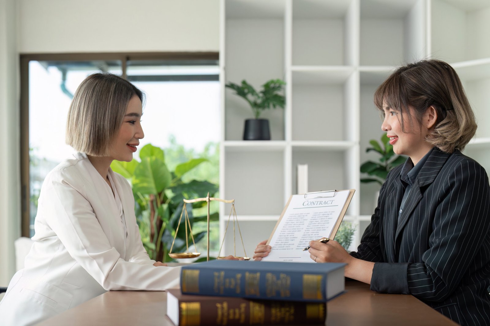 Company hired the lawyer office as a legal advisor and draft the contract so that the client could signs the right contract. Contract of sale was on the table in the lawyer office